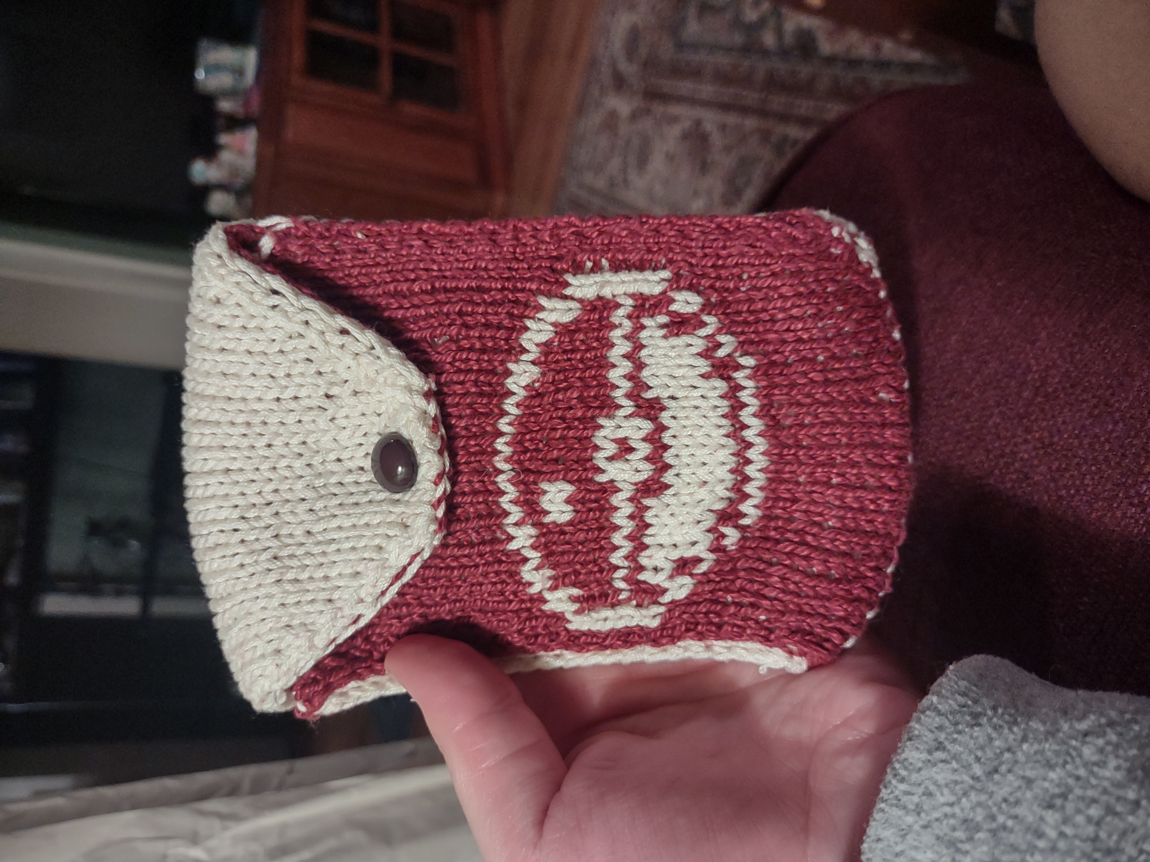 a small doubleknit bag with a pokeball on it